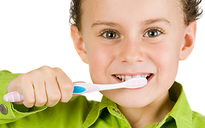Child brushing teeth