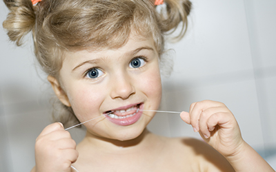Child with floss
