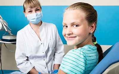Girl at dentist office