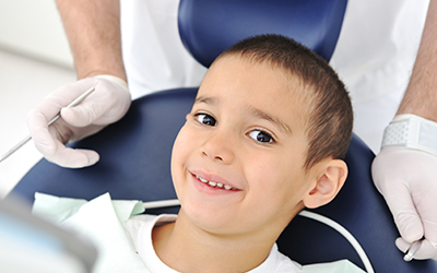 A young boy at the dentist